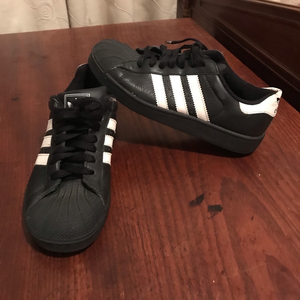 Black women’s Adidas sneakers